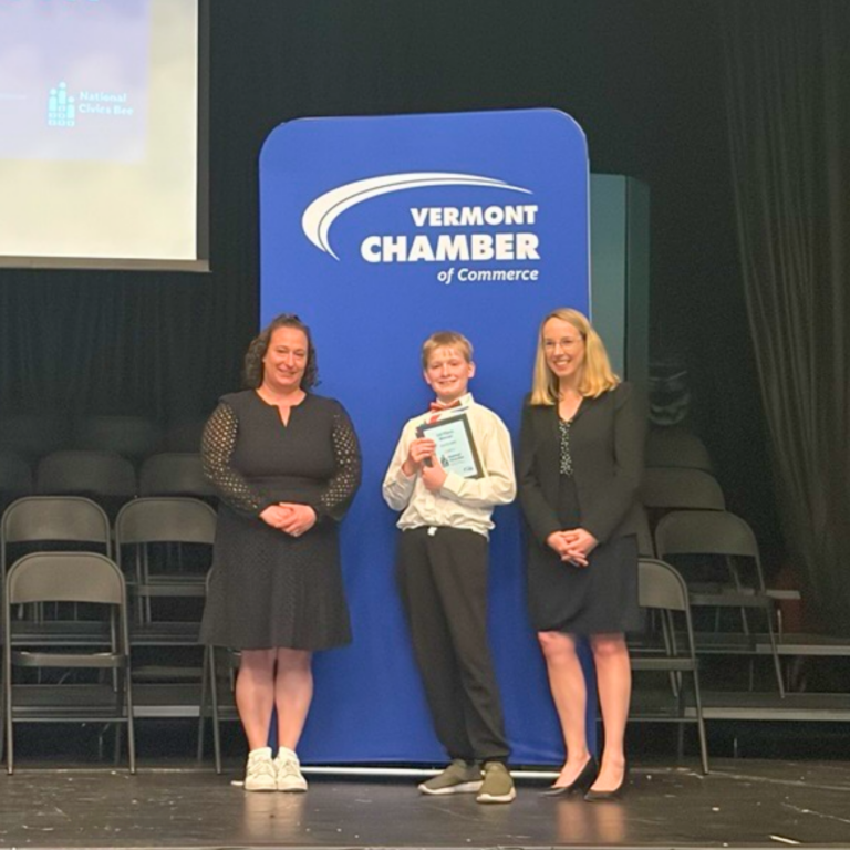 The Civics Bee State Finalist gets recognized on stage.