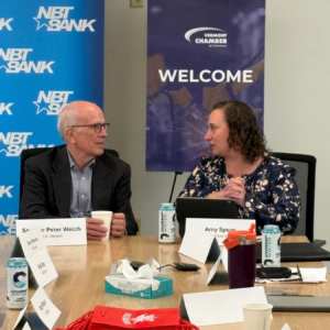 Senator Peter Welch and Vermont Chamber President Amy Spear talk during the Vermont Chamber's Wellspring Forum.