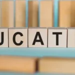 Small wooden blocks spelling out "education"